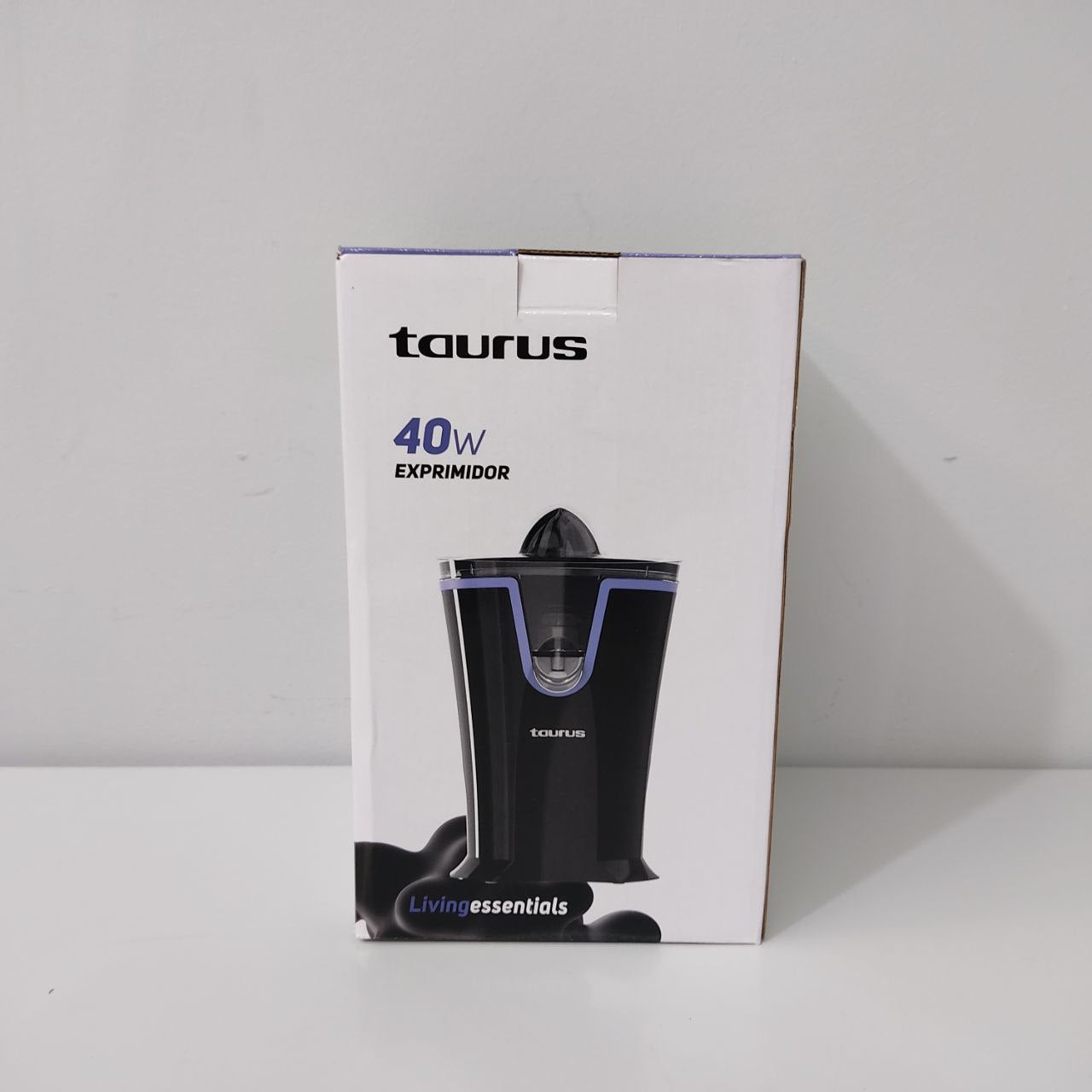 EXPRIMIDOR ELÉCTRICO TAURUS NEGRO 40W – VERTIDO DIRECTO Y FÁCIL DE USAR